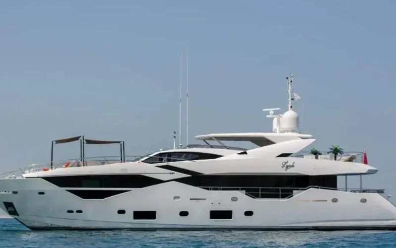 Side view of Legende Yacht cruising through icy waters