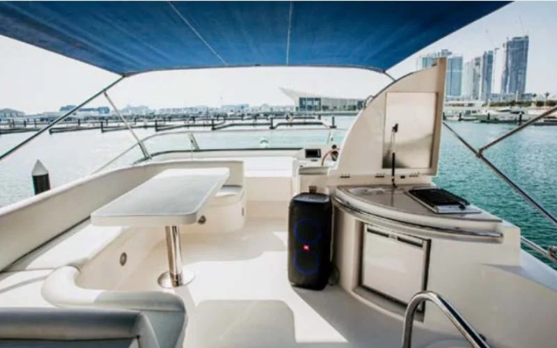"Modern dining and salon space in Lagoona 56ft yacht – Mala Yachts premium yacht rental Dubai experience"