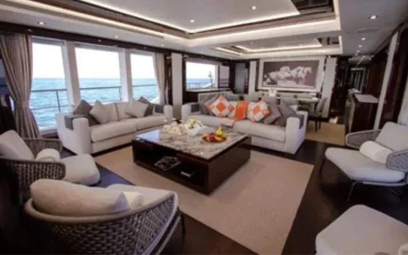 Luxurious lounge area with modern furnishings aboard Legende Yacht