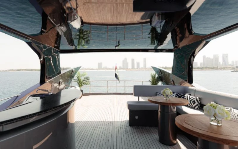 Stylish main salon with panoramic windows inside Matrix Yacht
