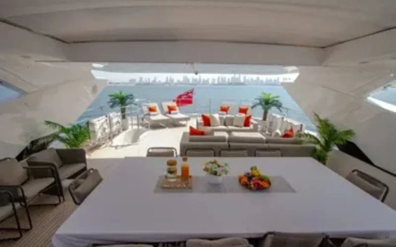 Spacious main salon with elegant décor and panoramic windows on Legende Yacht