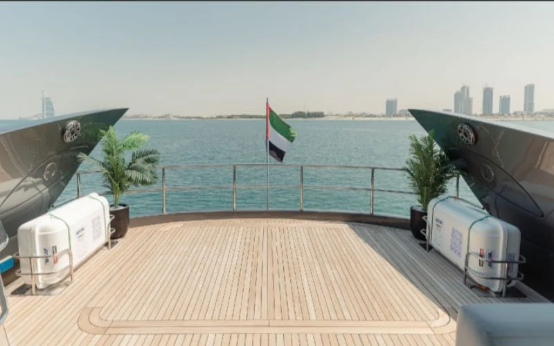 Cushioned deck chairs positioned under shade on Matrix Yacht upper deck