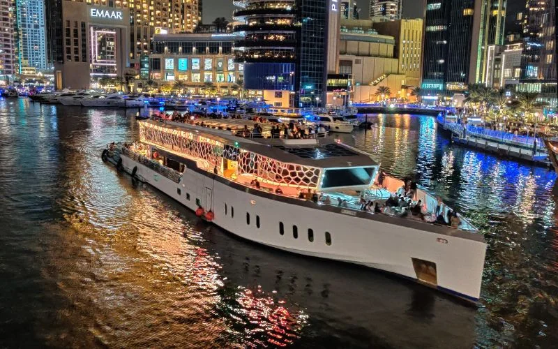 Flybridge of Lotus Royale Yacht featuring jacuzzi and sun loungers