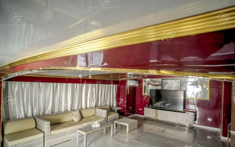 Luxurious living area with modern furniture inside 100ft Dream Yacht