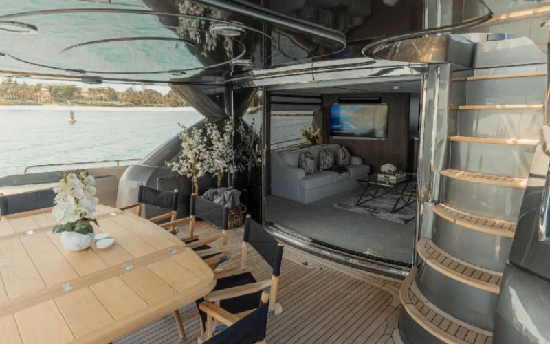 Reading nook with plush chair and sea-view window inside Matrix Yacht