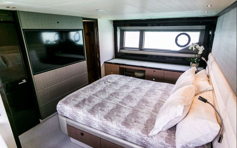 "Luxurious bedroom with panoramic sea views aboard My Serenity yacht – Mala Yachts premium yacht rental in Dubai"