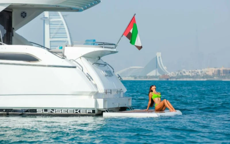 "Contemporary interior with plush seating and sleek design aboard Outlaw yacht – Mala Yachts luxury yacht rental in Dubai"