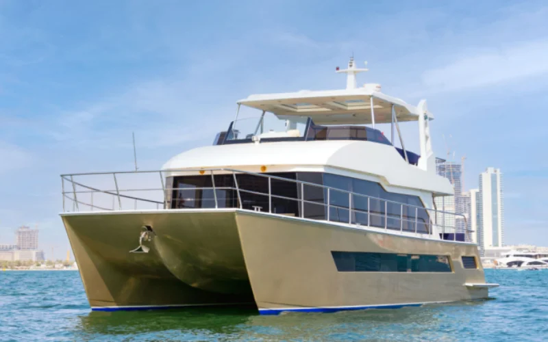 "60ft Explora yacht cruising along the Dubai coastline – Mala Yachts yacht rental in Dubai"