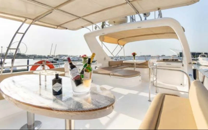 Spacious and elegant interior of the Silver Creek yacht featuring modern décor and plush seating – Mala Yachts provides premium yacht rental in Dubai for luxurious onboard comfort.