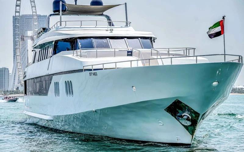 Sleek exterior view of the Ocean Dream yacht against the Dubai skyline – Mala Yachts specializes in luxury yacht rental Dubai services.