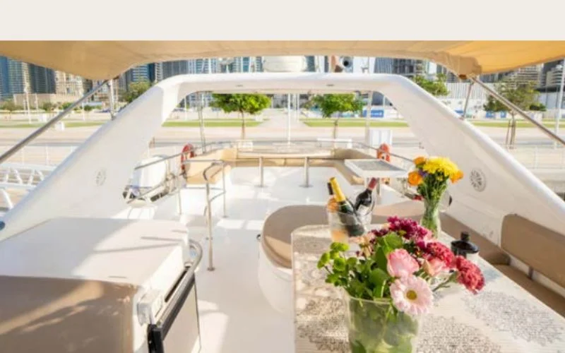 Elegant lounge area inside the Silver Creek yacht featuring plush seating and ambient lighting – Mala Yachts delivers first-class yacht rental in Dubai.