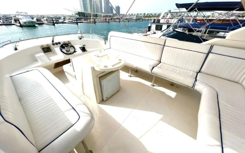 Comfortable sofa lounge in Riva 38ft yacht – yacht rental Dubai by Mala Yachts
