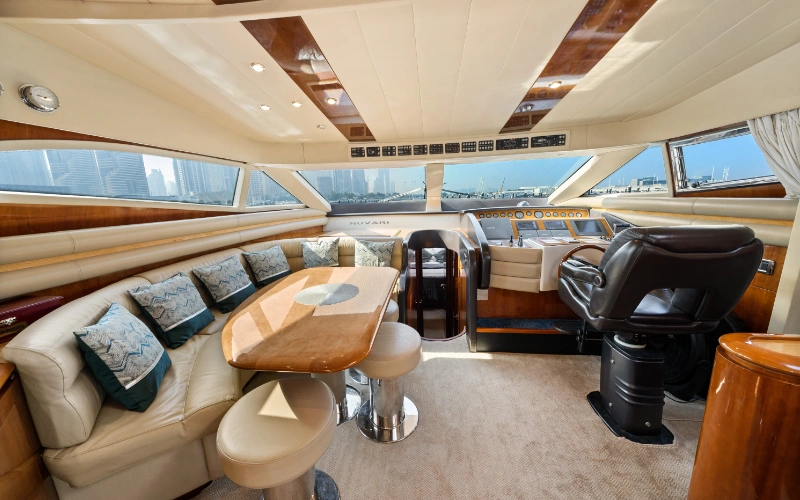 Well-lit interior passageway aboard the Gulf Craft 60ft yacht leading to bedrooms – discover luxurious detailing with Mala Yachts’ yacht rental in Dubai.