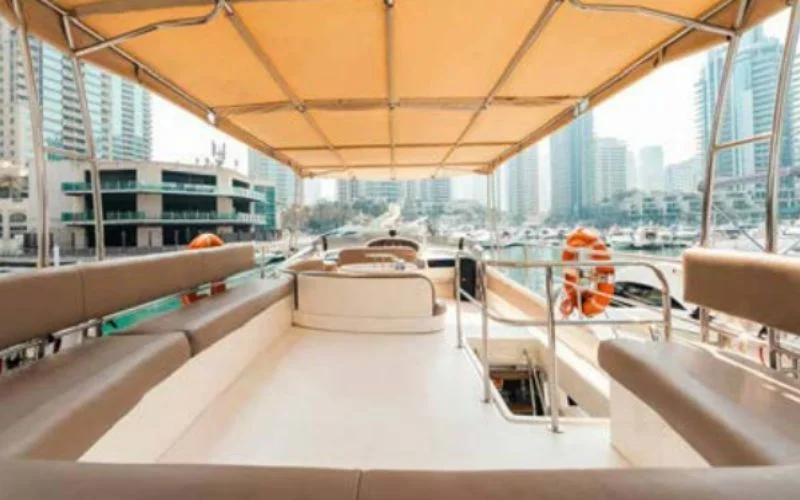 Beautifully decorated interior of Etosha yacht prepared for a private celebration – Mala Yachts specializes in personalized yacht rental in Dubai for events.