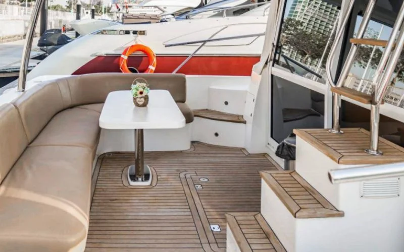 "Cozy salon with elegant finish in Majesty 48 – Mala Yachts offering premium yacht rental in Dubai"