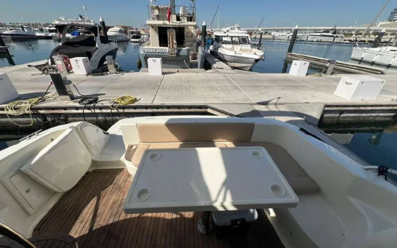 Functional galley in the Cranchi yacht with modern appliances – Mala Yachts delivers convenient and luxurious yacht rental in Dubai.