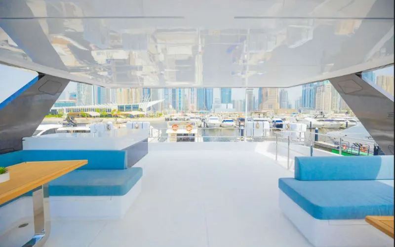 "Elegant wooden interior with natural lighting – Mala Yachts luxury 61SW yacht rental in Dubai"