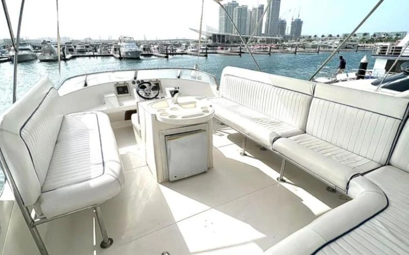 Comfortable lounge seating inside Riva yacht – Mala Yachts yacht rental in Dubai