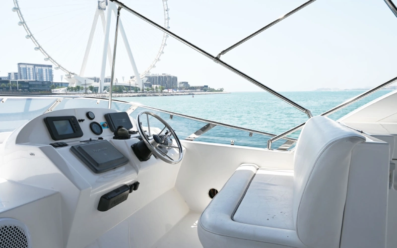 Modern captain area with full control panel on Azimuth 58ft yacht – yacht rental Dubai by Mala Yachts