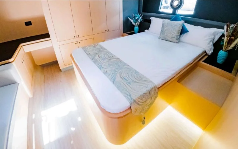 Cozy double bedroom on the Meridian 45ft yacht designed for restful nights at sea – experience peaceful overnight stays with Mala Yachts’ yacht rental in Dubai.