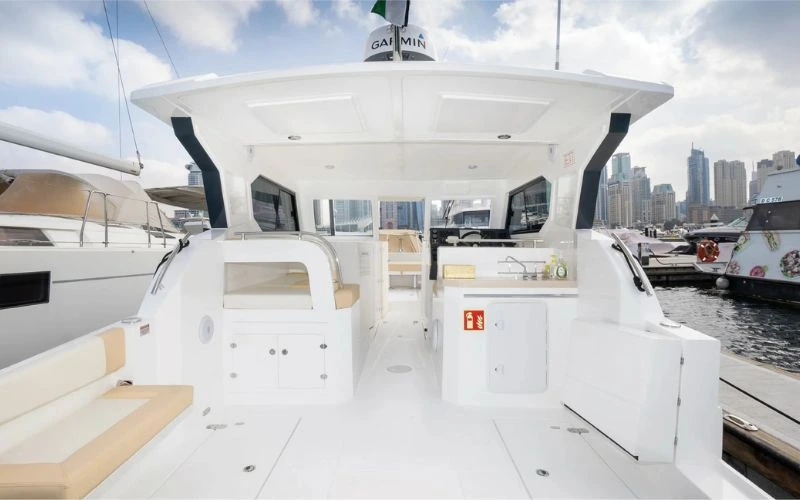 Modern interior of the Storm 36ft yacht with sleek seating – Mala Yachts offers top-rated yacht rental in Dubai for luxury seekers.