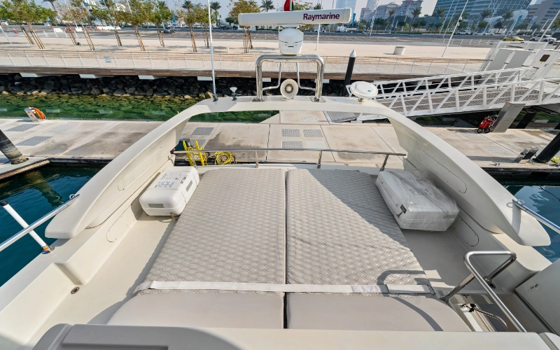 Open flybridge of the Gulf Craft 60ft yacht offering panoramic views and sea breeze – experience elevated cruising with Mala Yachts’ yacht rental in Dubai.