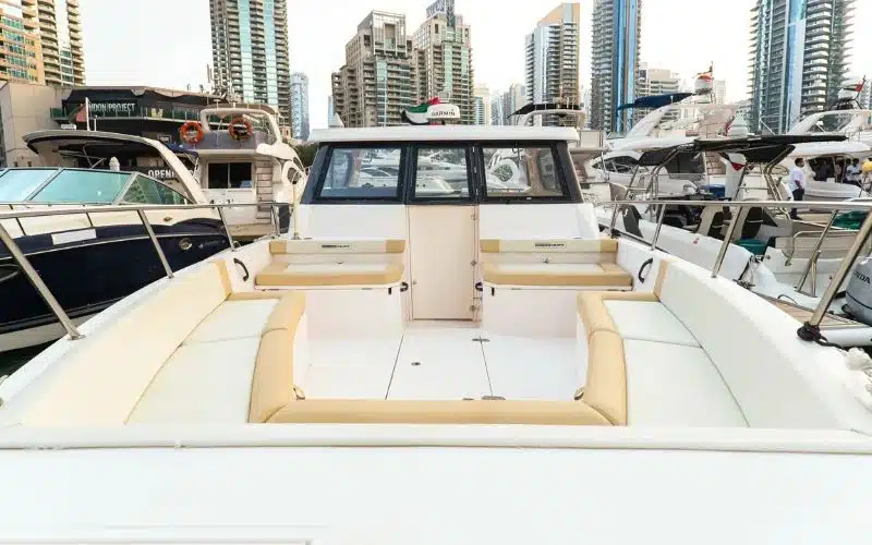 Well-lit interior of the Thunder yacht featuring soft tones and spacious design – experience relaxed yacht rental in Dubai with Mala Yachts.
