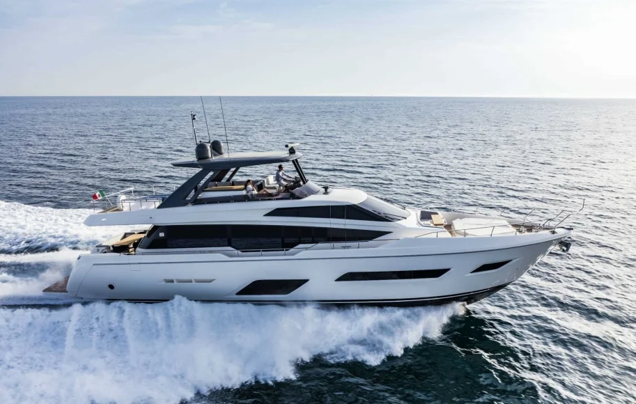 Side profile of Ferretti 78 cruising along the Dubai coast – embrace Italian craftsmanship with Mala Yachts’ yacht rental in Dubai.