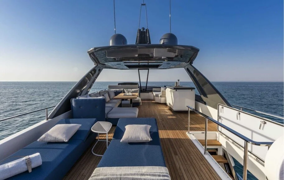 Open-concept lounge and dining area aboard the Ferretti 78 – perfect for socializing during your yacht rental in Dubai with Mala Yachts.