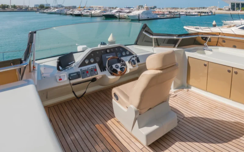 "Modern captain’s helm with advanced navigation system aboard Explora 60ft yacht – Mala Yachts yacht rental in Dubai"