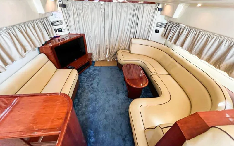Premium lounge area inside Fairline 45ft yacht in Abu Dhabi – yacht rental Dubai by Mala Yachts