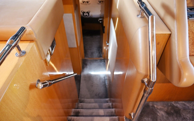 Interior stairs connecting yacht levels on Azimuth 58ft – yacht rental Dubai by Mala Yachts