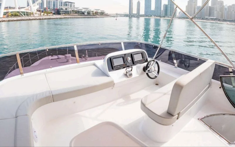 Modern helm station on the Meridian 45ft yacht with advanced navigation controls and panoramic sea views – enjoy a smooth and professional journey with Mala Yachts’ yacht rental in Dubai.