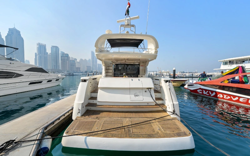 Front bow lounge area on Gulf Craft 60ft yacht ideal for sunbathing and skyline views – unwind with Mala Yachts’ exclusive yacht rental in Dubai.