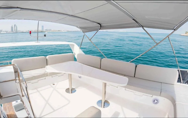 Compact galley in the Meridian 45ft yacht with essential appliances for onboard meals – cook and cruise with Mala Yachts’ yacht rental in Dubai.