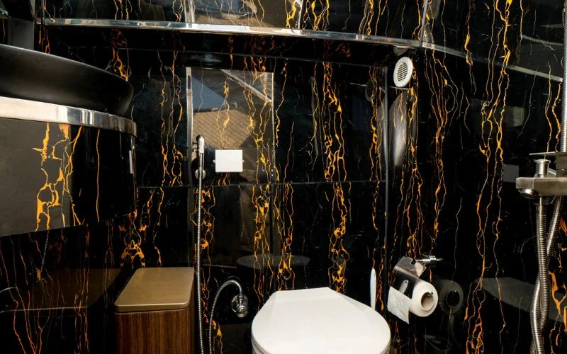 Modern washroom onboard the Riverside yacht featuring sleek fittings and premium finishes – Mala Yachts ensures elegant comfort with yacht rental in Dubai.