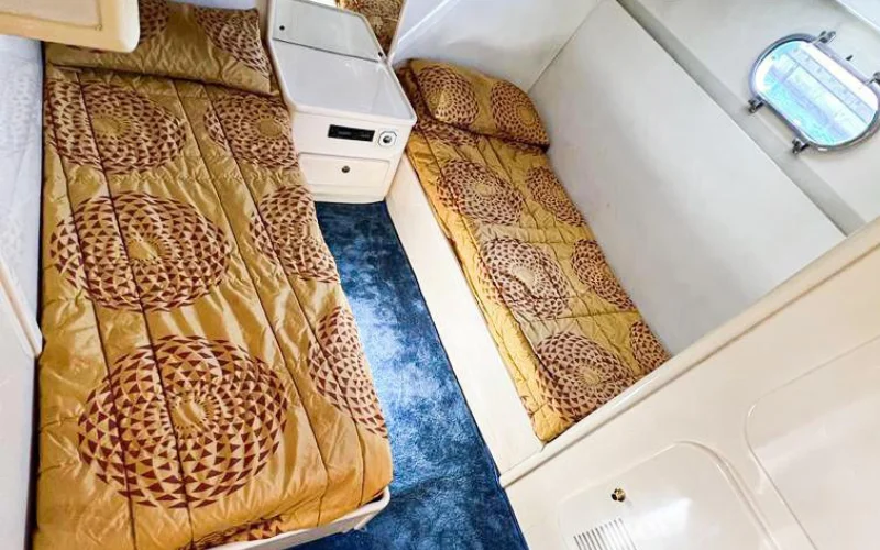 Comfortable twin bed setup for guests – Mala Yachts yacht rental in Dubai