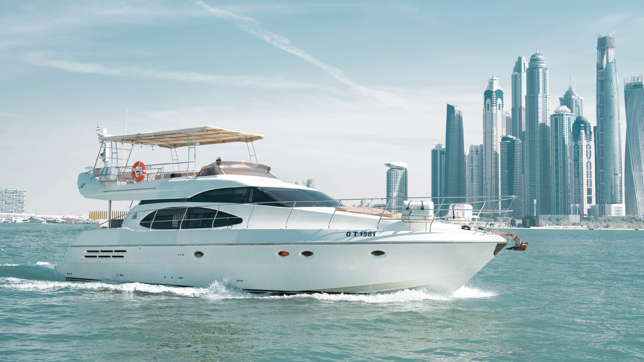 Etosha yacht sailing through Dubai’s turquoise waters – Mala Yachts offers exclusive yacht rental in Dubai for luxury sea adventures.