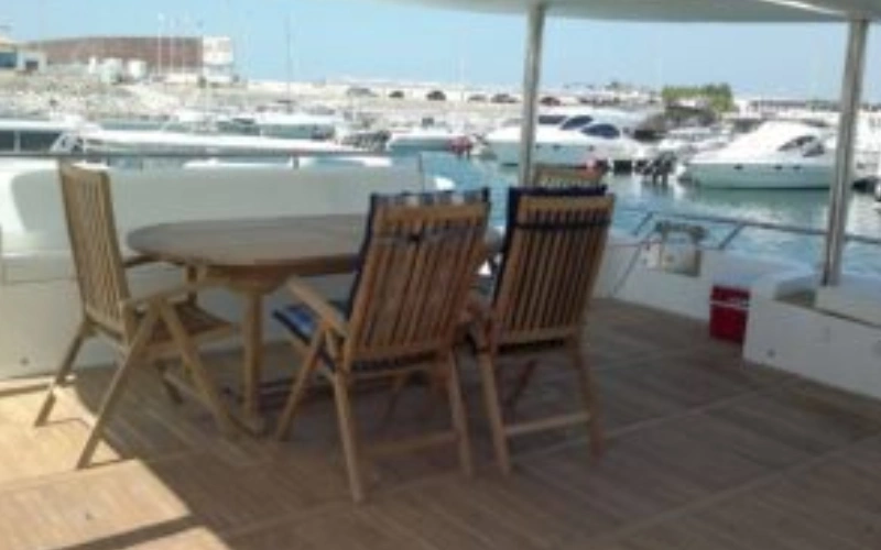 Outdoor seating area on Open Boat Yacht – yacht rental Dubai by Mala Yachts