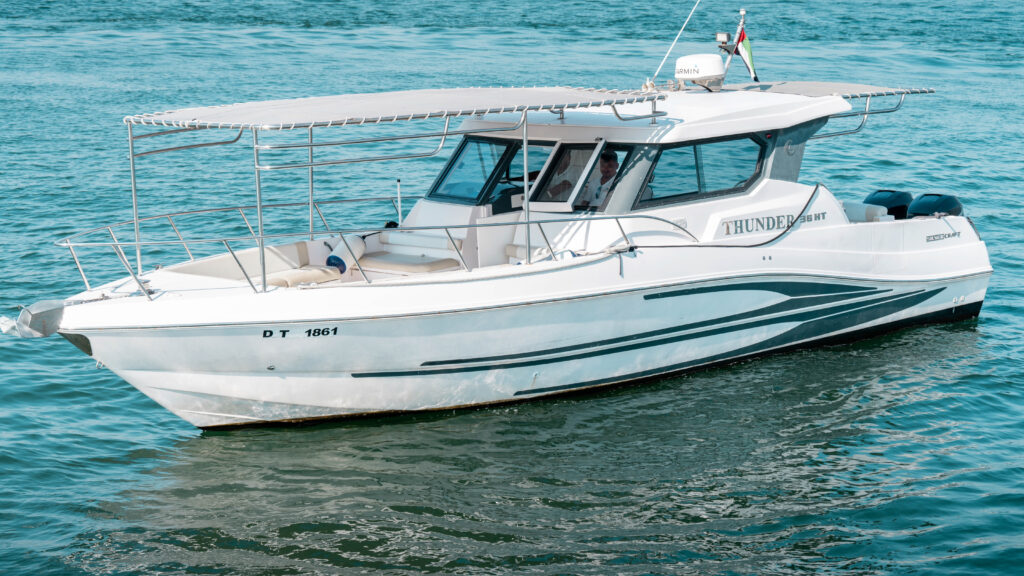 Sleek exterior of the Thunder yacht docked at Dubai Marina – experience stylish and premium yacht rental in Dubai with Mala Yachts.