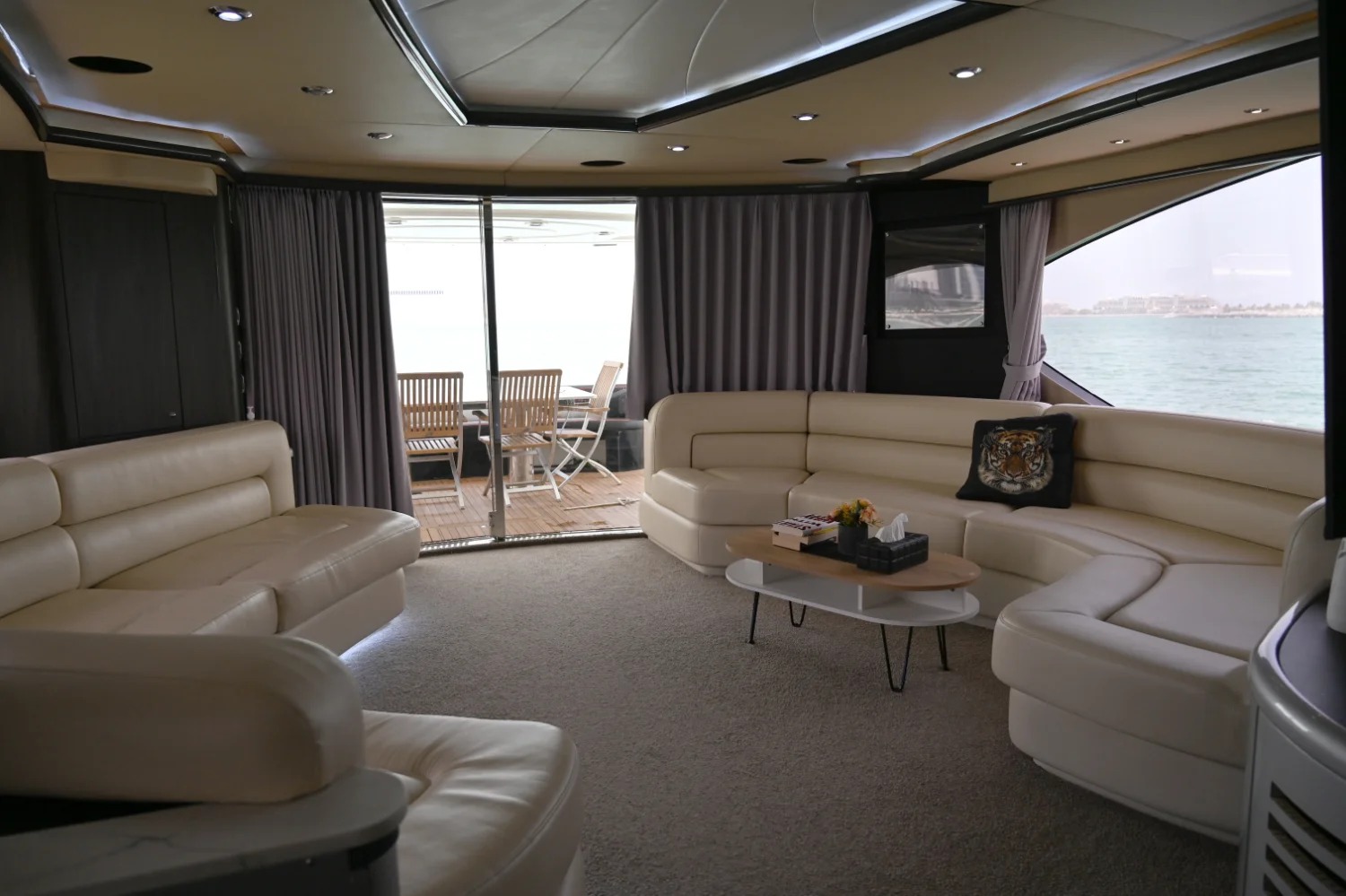 Spacious and stylish Sunseeker 64ft yacht interior – Mala Yachts premium yacht rental Dubai service