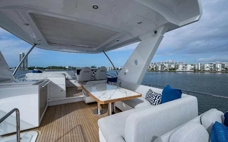 Spacious salon with modern furnishings inside Azimut 66 – Mala Yachts yacht rental Dubai experience