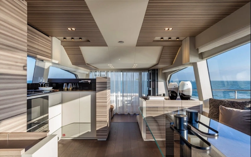 Front deck of the Ferretti 67 yacht offering panoramic views and comfortable seating – perfect your voyage with Mala Yachts’ yacht rental in Dubai.