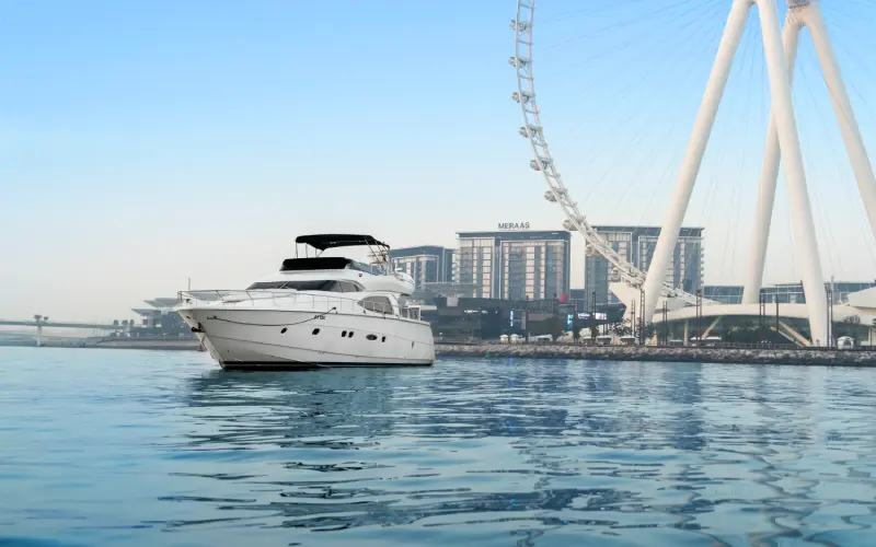 Sleek Gulf Craft 60ft yacht cruising through the Arabian Gulf, ideal for luxury escapes – experience yacht rental in Dubai with Mala Yachts.