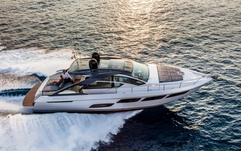 Luxury yacht cruising on open waters during sunset – Mala Yachts offering premium yacht rental in Dubai