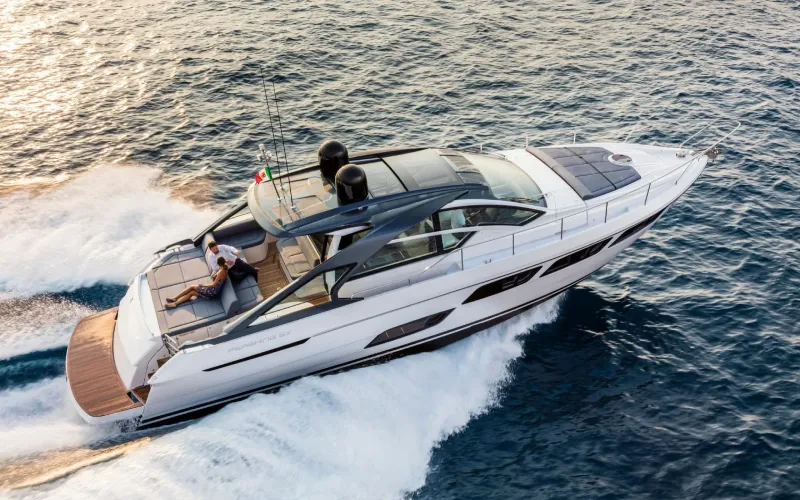 Pershing 5X yacht cruising at high speed near Dubai Marina – yacht rental in Dubai by Mala Yachts