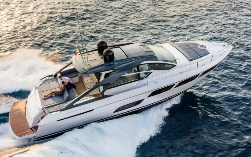 Rear view of Pershing 5X 2024 highlighting its open swim platform and contemporary layout – redefine seafront leisure with Mala Yachts’ yacht rental in Dubai.