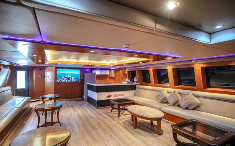 Stylish interior of Ocean Dream yacht featuring modern lounge and premium finishes – Mala Yachts offers luxury yacht rental Dubai experiences.