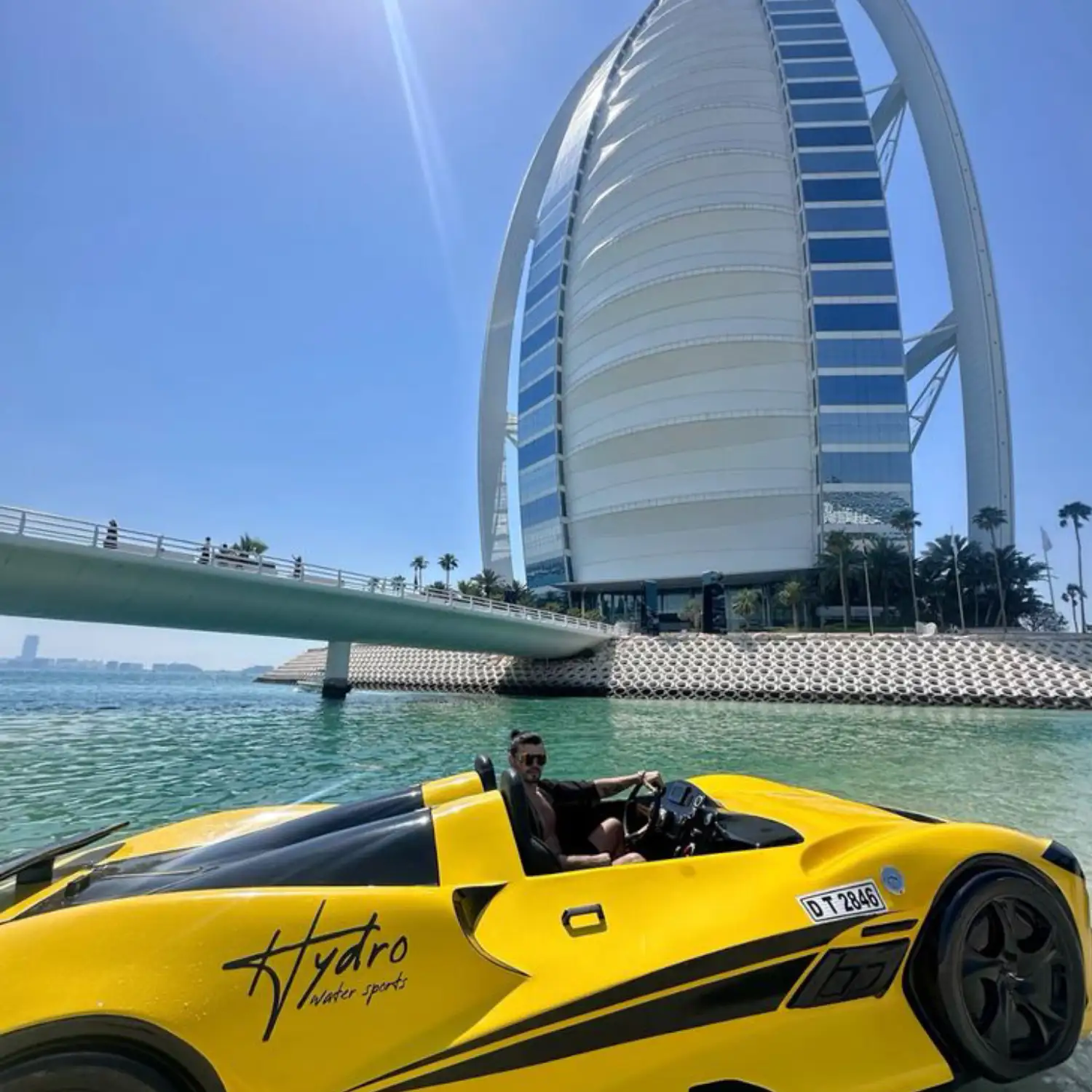 "High-speed water adventure in a stylish jetcar under sunny skies"